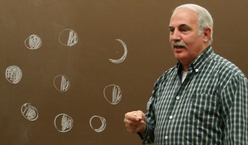 Tom O Grady in front of lunar diagram