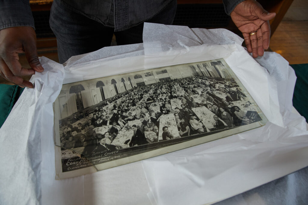 Rev. Kendrick shows a banquet photo from Cory’s heyday