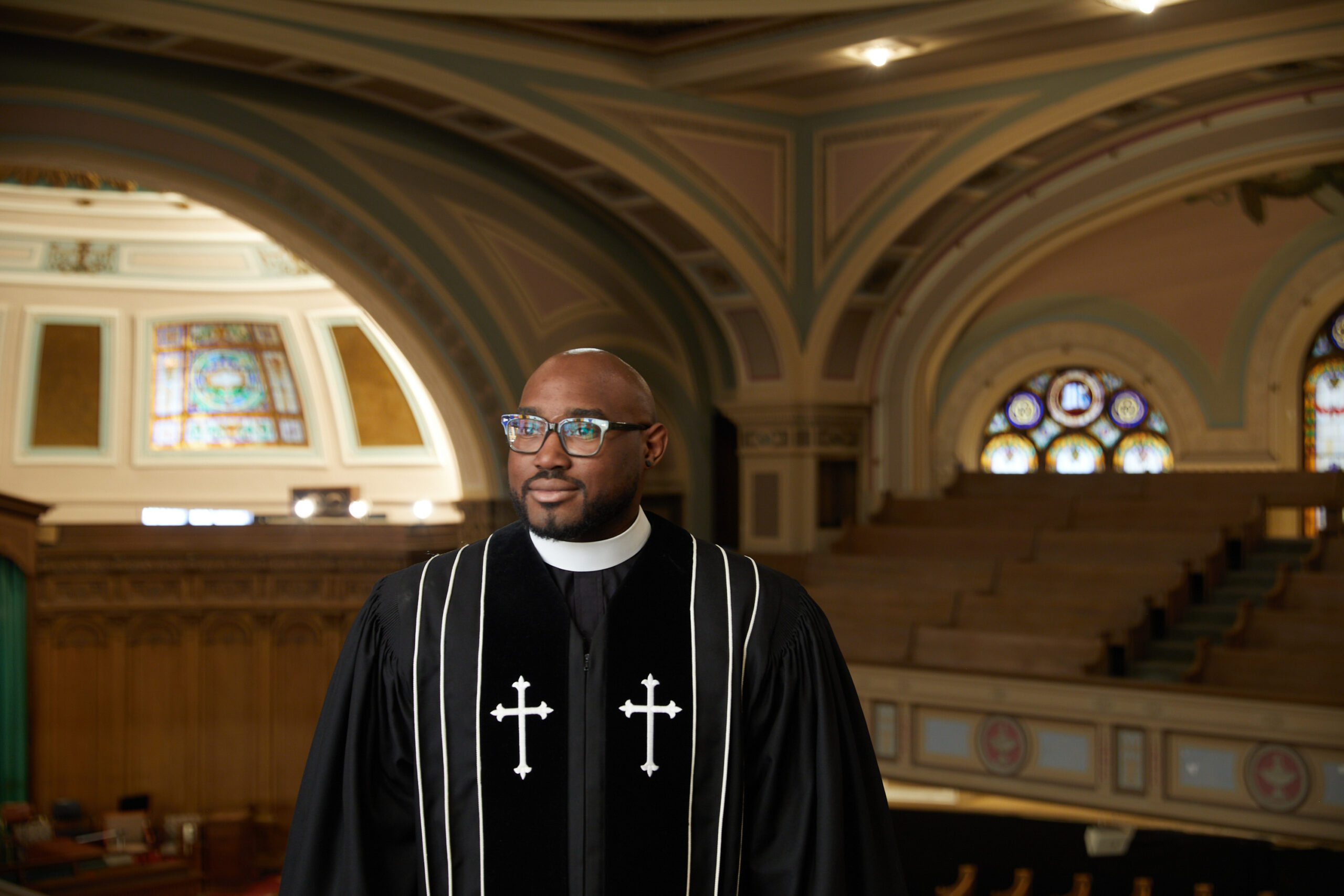 Rev Kendrick stands in Cory's sanctuary